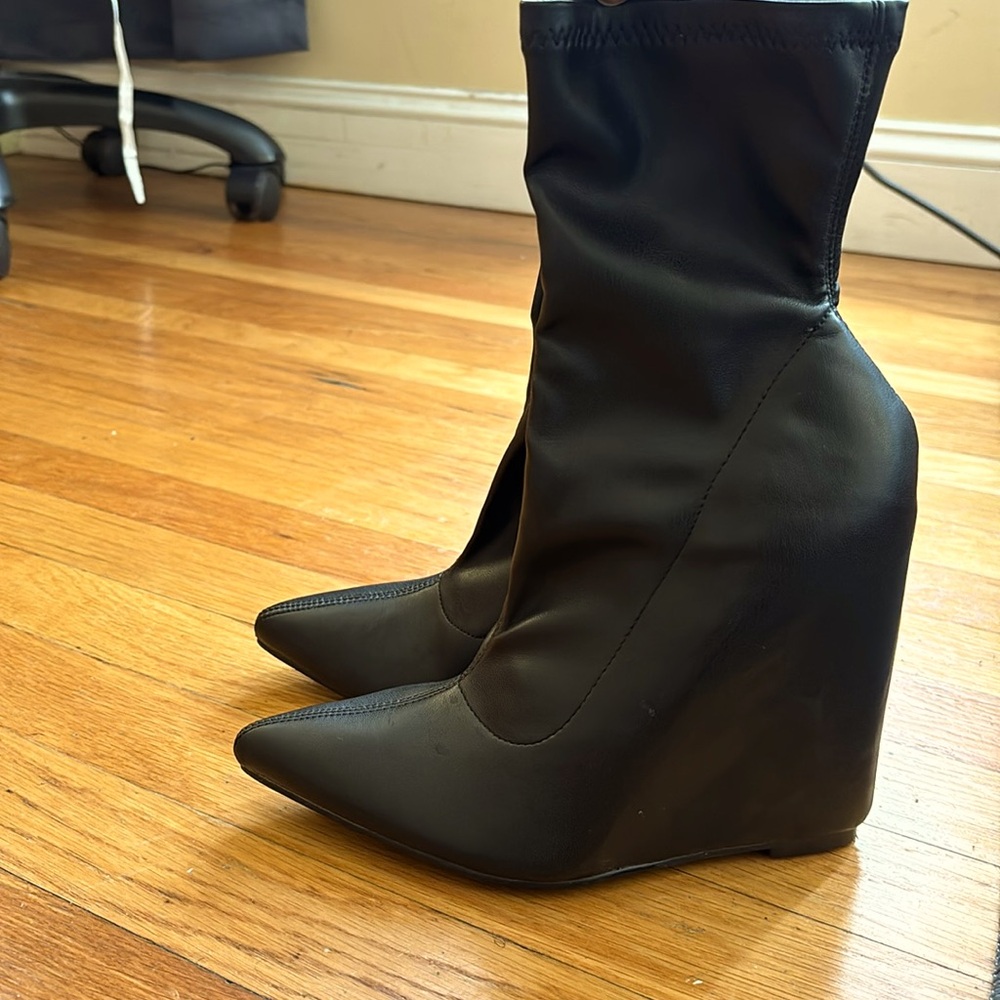 Black leather wedge boots
